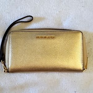 Michael Kors metallic gold zip around wallet
